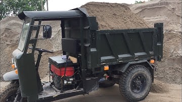 công nông chở gạch siêu khỏemáy súc bốc đầu quá nguy hiểm.công nông chở cát The excavator is too