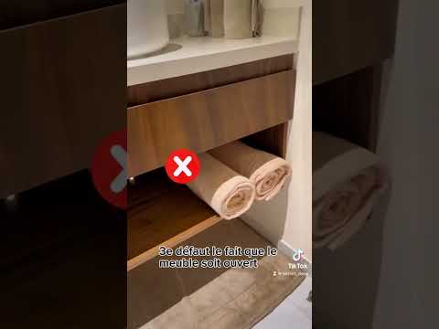 Vidéo: Lavabos avec meuble dans la salle de bain: options photo