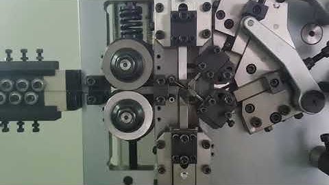 0.4mm coiling machine , the speed is 45pcs/min