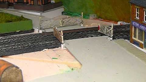 Operating level crossing gates