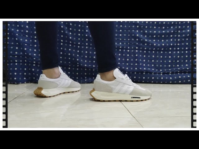 E5 YouTube retropy on Adidas in white feet -