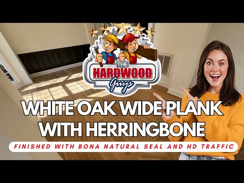 Wide plank white oak hardwood floor with herringbone patterns installed in a Cumming, Georgia home