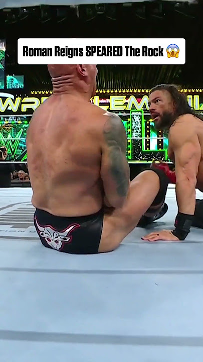 ROMAN REIGNS SPEARED THE ROCK 😱 (via WWE) #shorts