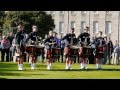 The pipes and drums of dollar academy in holyrood palace gardens