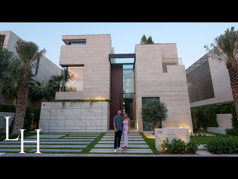 Video: Casa de lux de trei niveluri care prezintă o arhitectură modernă complexă: Vila Amwaj