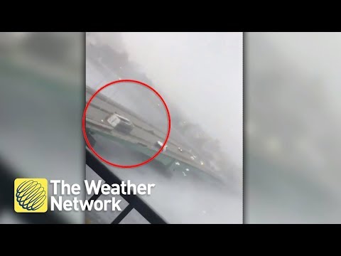 SCARY: Vehicles are thrown around on bridge in Japan during Typhoon Jebi