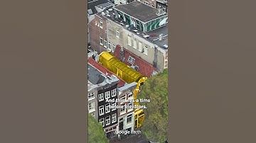 Why do buildings in Amsterdam learn forward?