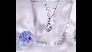 スカイブルー爽やかブルートパーズ6mm のワイヤーラッピングネックレス