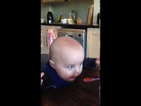 Hungry baby loving his carrots!