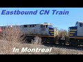 4 7 24 EASTBOUND CN TRAIN THROUGH BAIE-D&#39;URFE IN MONTREAL