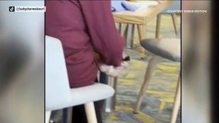 Viral video shows woman scratching foot with fork on cruise