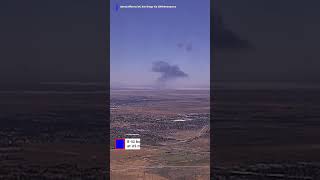 Large smoke plume rising above the desert after a B-52 bomber crashed after takeoff