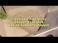 Cleaning shower base with baking soda and vinegar