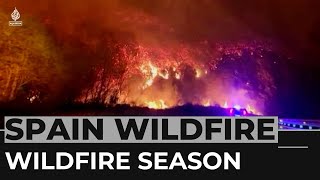 Firefighters battle more than 100 wildfires in Spain