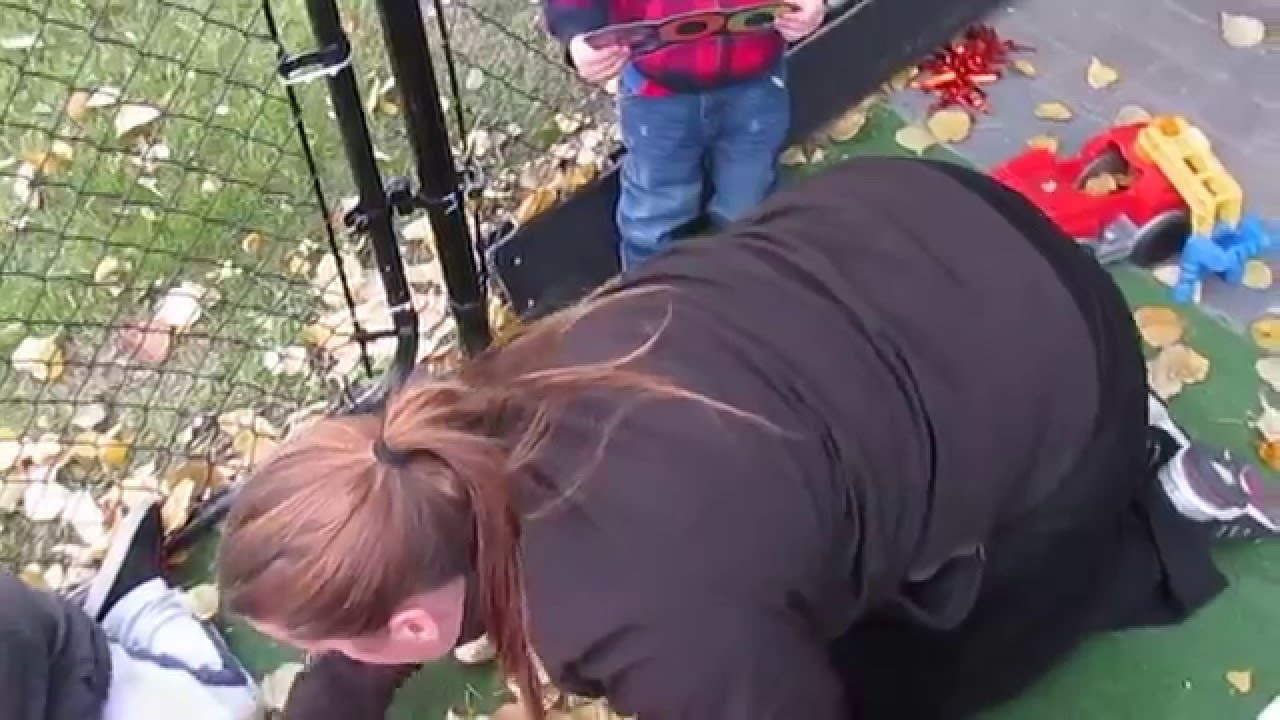 Cochrane Early Learning Centre- Playing with leaves.