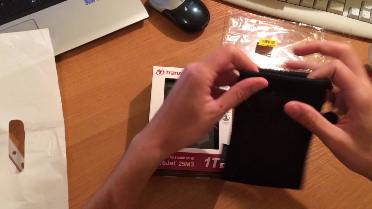 Распаковка жесткого диска Transcend StoreJet 25M3 1TB TS1TSJ25M3  из интернет-супермаркета Rozetka