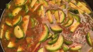 طبخ الكوسة بطريقة جديدة/ cooking zucchini with tomato sauce /مع الشيف ايمن حسن .