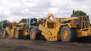 Collins Earthworks New 637K Scrapers Working
