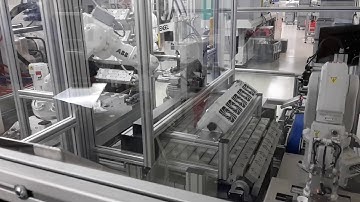 Robotic assembly cell