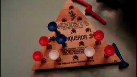 Triangle jump peg game solution