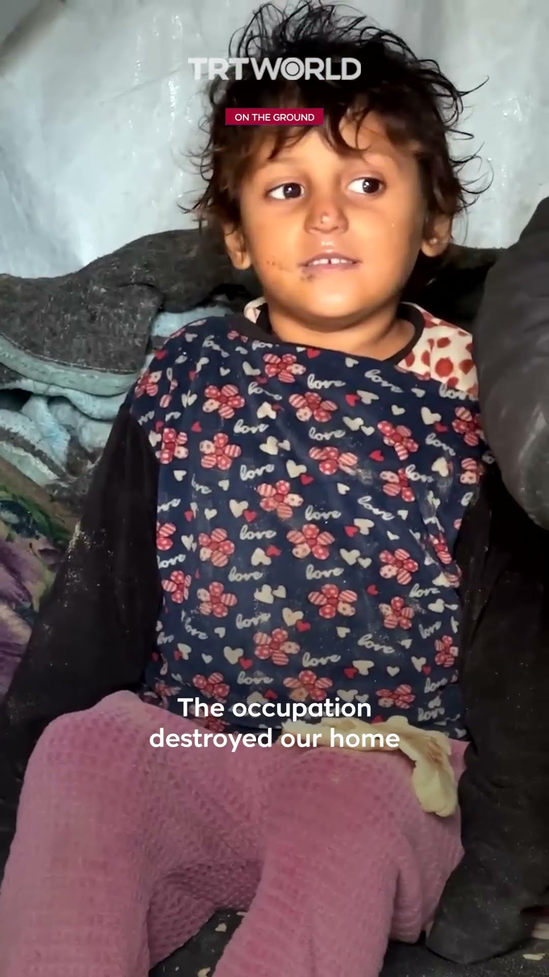 Palestinian girl shivers in the cold as winter weather devastates displaced Palestinians' tents