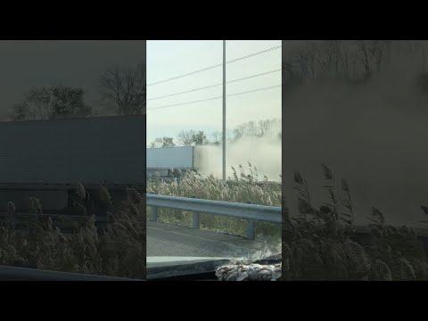 Smoking Semi Continues to Trudge Down Highway || ViralHog