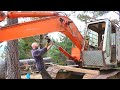 Fixing leaky boom cylinders on the abandoned excavator