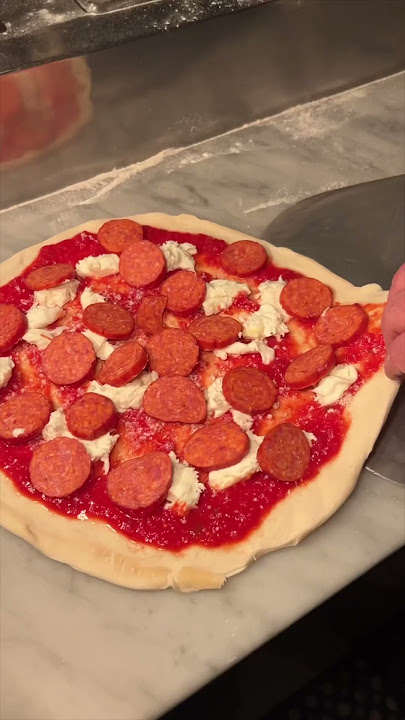 The HOT HONEY PIZZA from Capizzi in Hells Kitchen NYC! 🔥 pepperoni is a game changer! #DEVOURPOWER