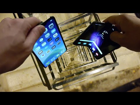 Dropping Samsung Galaxy Fold vs iPhone 11 Pro Max vs Nokia 3310 Down Spiral Staircase – 20 Stories