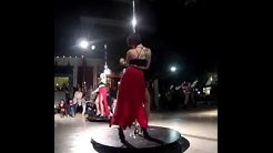 A couple dances a Ukranian folk dance.