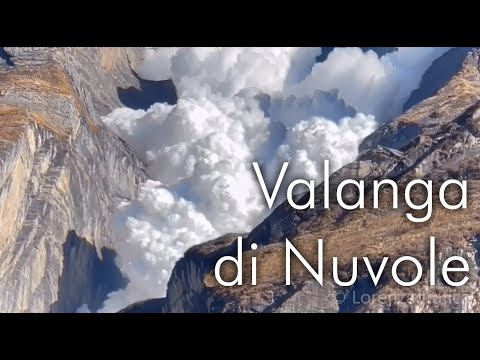 Video: Picchi Di Montagna E Nuvole Leggere
