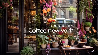 Enjoy Your Morning Coffee In New York At A Cafe Full Of Flowers