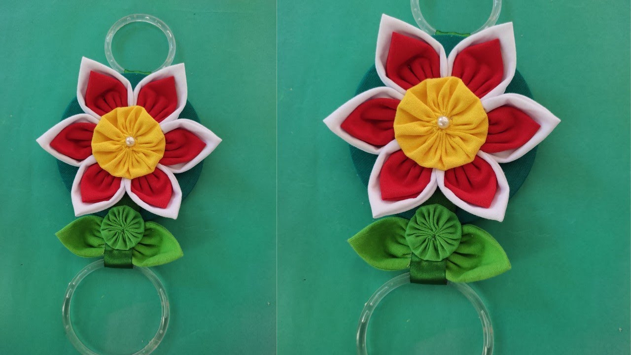 PORTA PANO DE PRATO COM FLOR DIFERENTE FEITA COM FUXICO #super fácil e rápida #