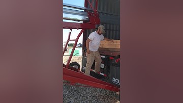 Loading soybeans on containers.