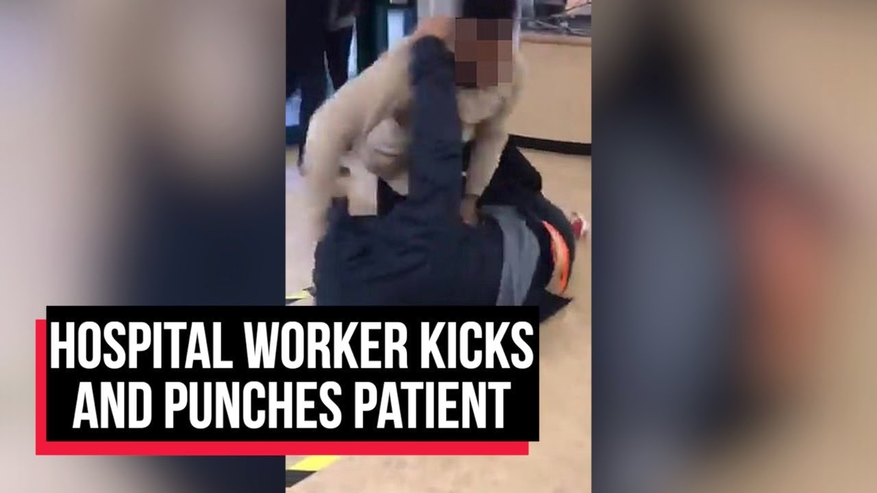 Hospital worker kicks and punches patient as afurious brawl breaks out