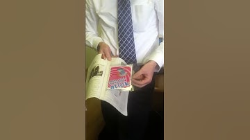 Clear envelope mailer inserted into magazine