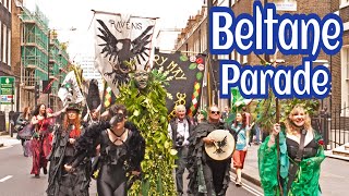 Beltane Parade Glastonbury '23 Green Men Carrying May Pole, Beltane Dragon & Beltane King & Queen