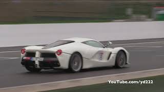 This video features a white ferrari laferrari on track at the formula
1 circuit of spa-francorchamps. you can hear it going up and down
straights towards...