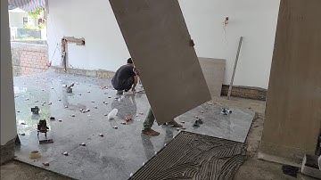 Thi công lát gạch nền khổ 900x1800 cách 1mình xuống viên gạch lớn tập 871