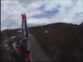 Wingsuit flyer hits bridge