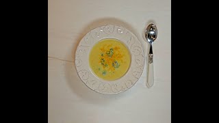 Potato cream soup with broccoli chunks