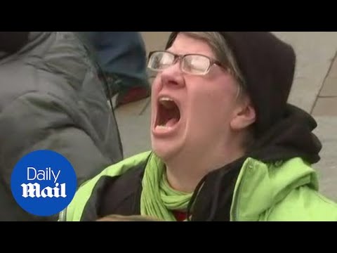 Moment emotional woman yells as Trump is declared President of the US - Daily Mail