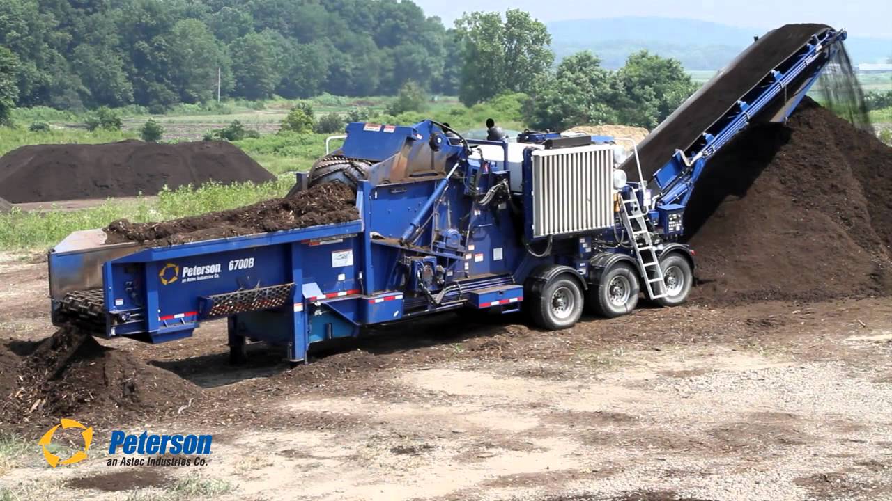 Peterson 6700B horizontal grinder making mulch YouTube