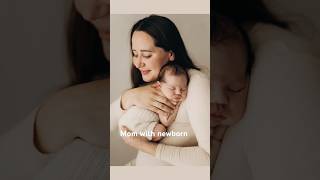 Posing mother with a newborn baby