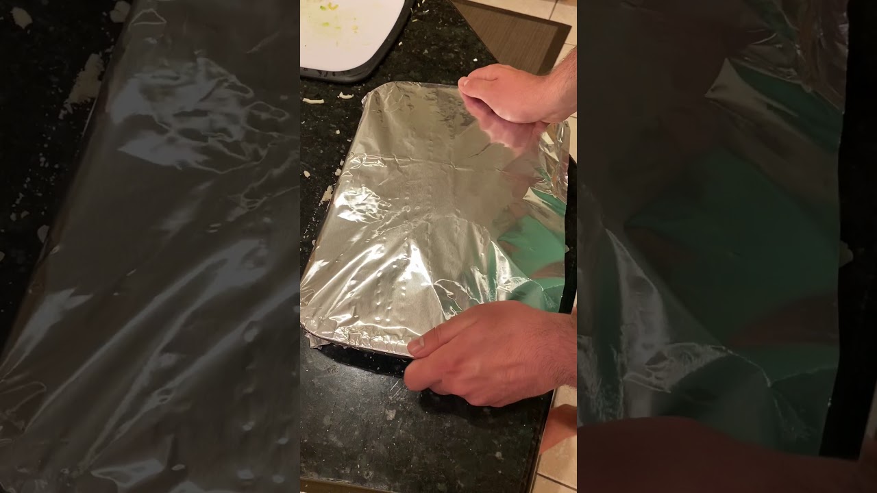 Covering lasagna with aluminum foil
