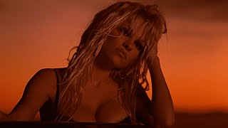 Pamela Anderson as Barbara "Barb Wire". Word Up! (Korn)