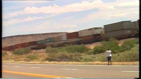 BNSF stack trains passing by in Mojave Desert