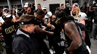 SAINTS LOCKEROOM CELEBRATING AFTER WINING DIVISION