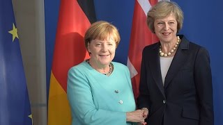 Theresa May and Angela Merkel's friendly first meeting