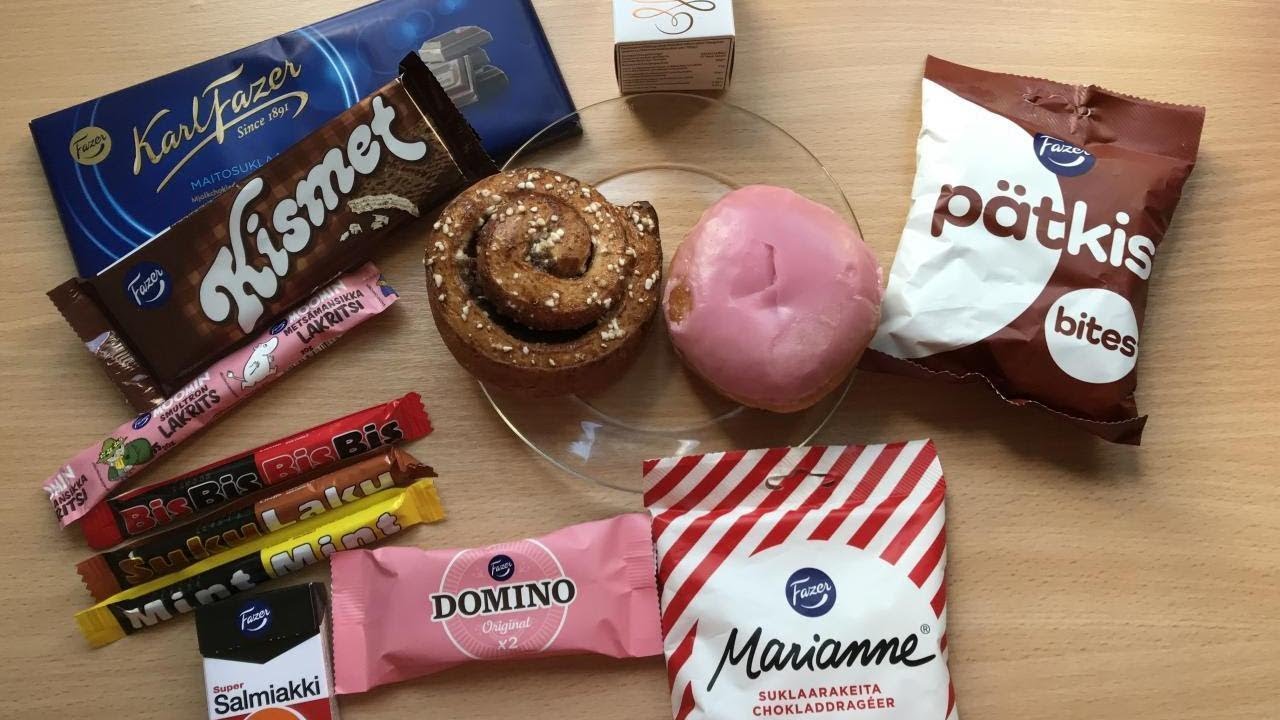 Portuguese volunteer trying Finnish candies